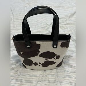 Cow print purse - zipper closure - adjustable strap - ASOS